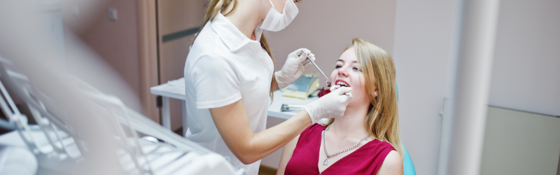 Doctor Checking Patient Teeth