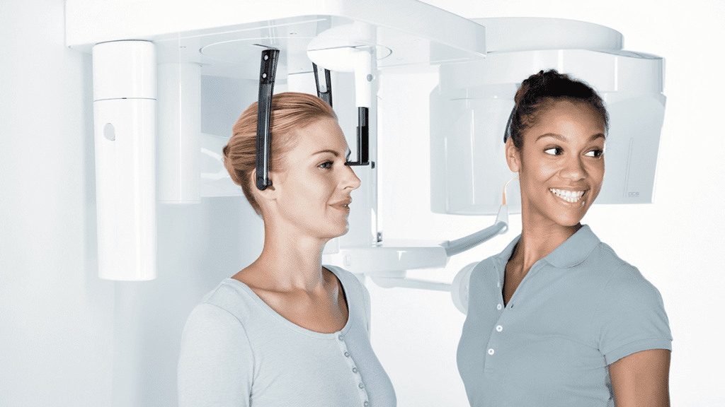 patient with 3D scanner around head