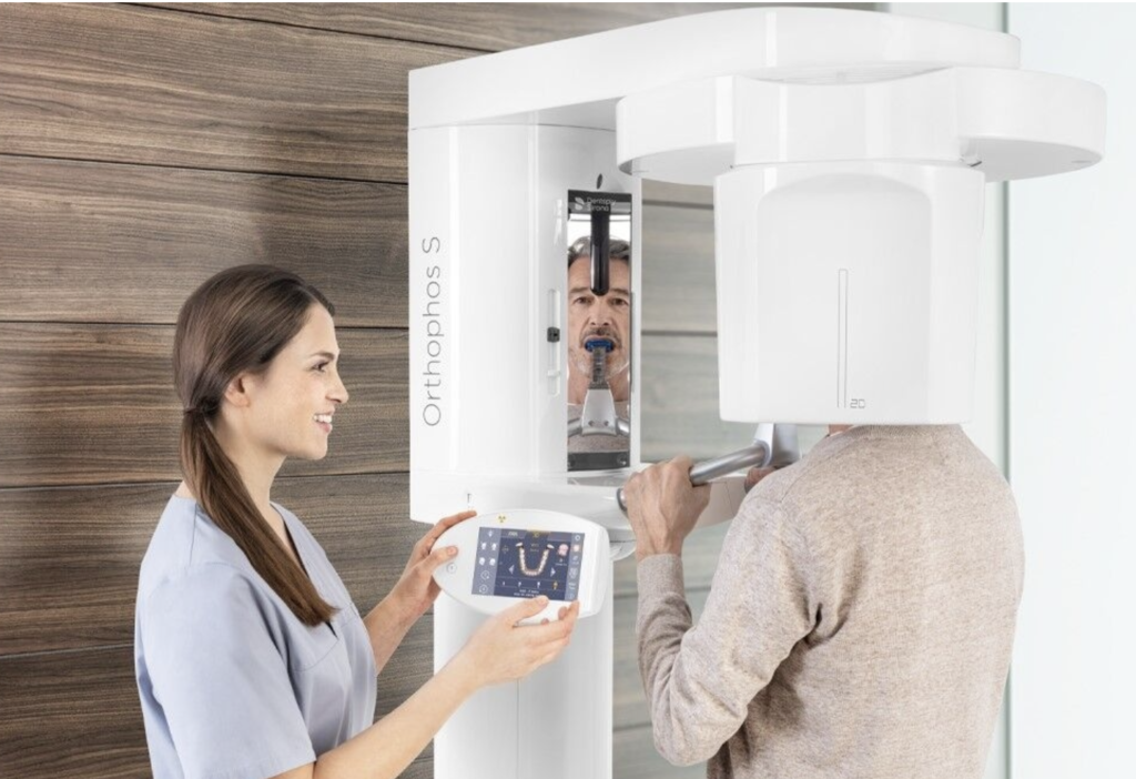  A patient uses a modern X-ray machine at a dentist’s office