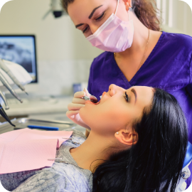 Doctor Checking Woman Teeth