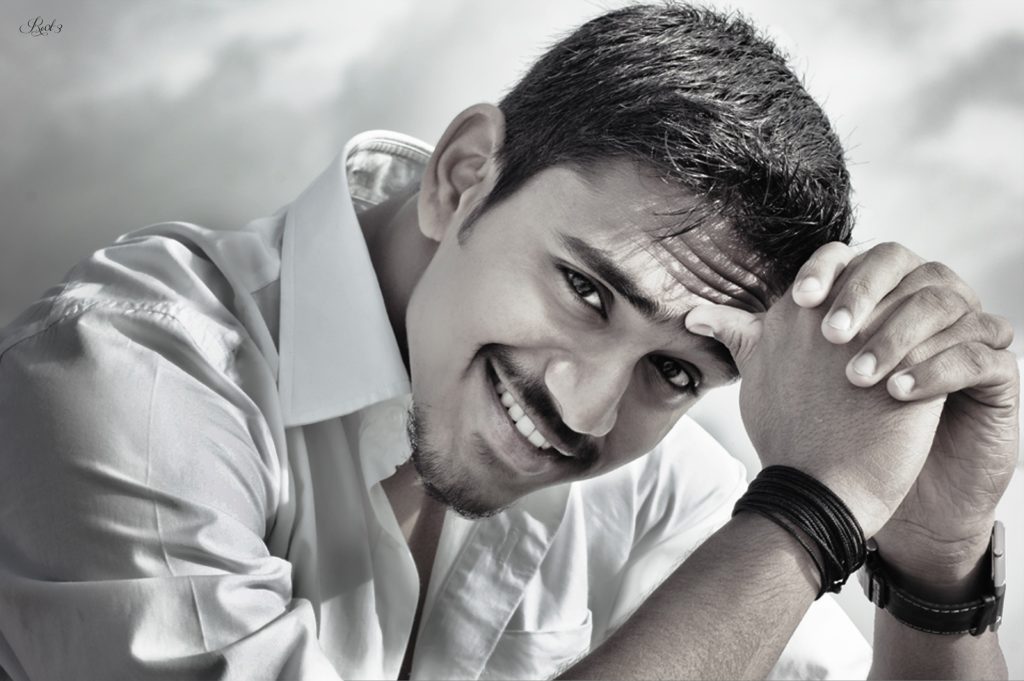 man smiling after changing to a new dentist