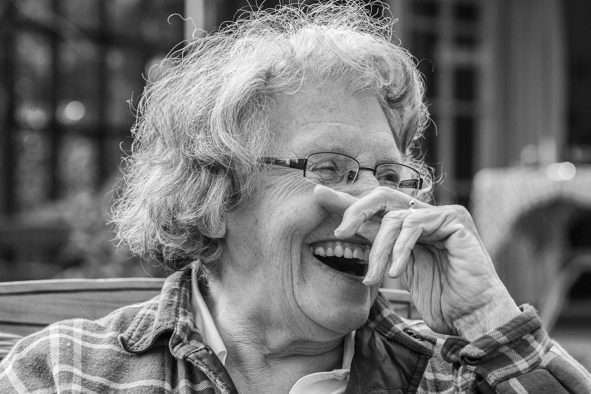 a woman with partial implant dentures laughing