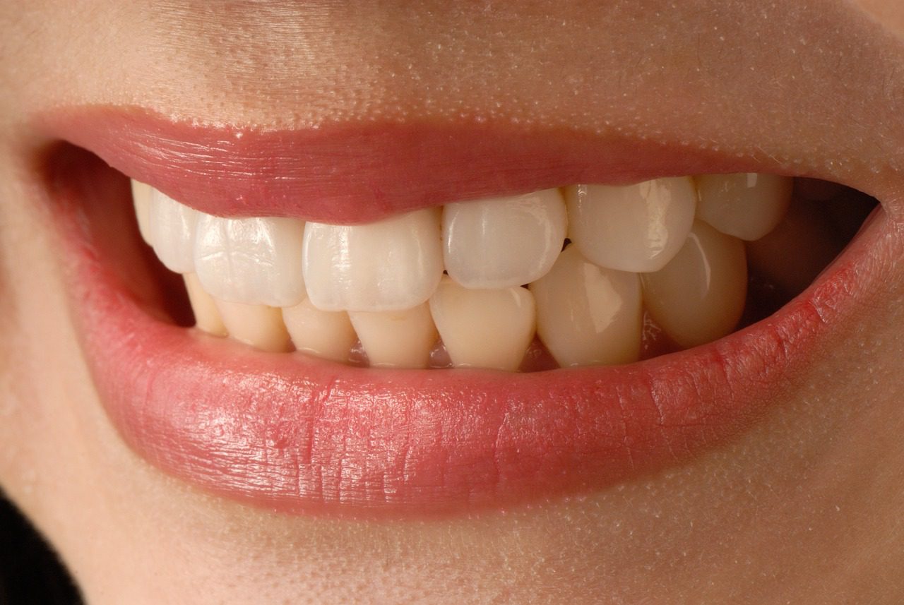 close-up photo of woman smiling